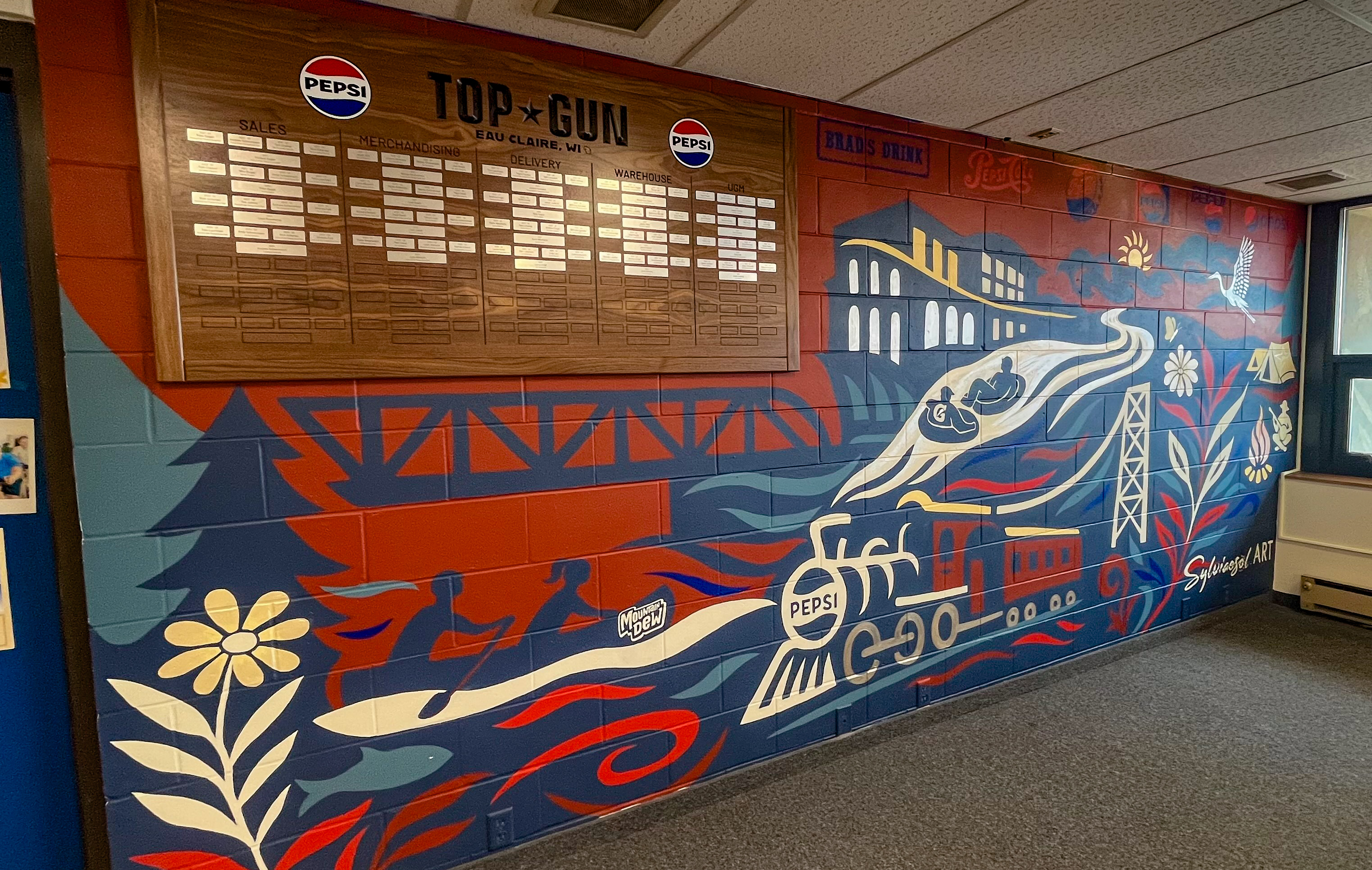 PepsiCo mural detail showing landmark and brand elements.